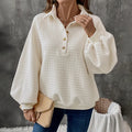 Women's milky white polo collar sweater with long sleeves and a solid colour texture.
