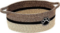 Small light beige handmade cotton rope storage basket with a wooden handle.
