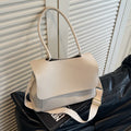 Vintage casual tote bag in horizontal square shape with double shoulder straps and visible sewing thread detailing