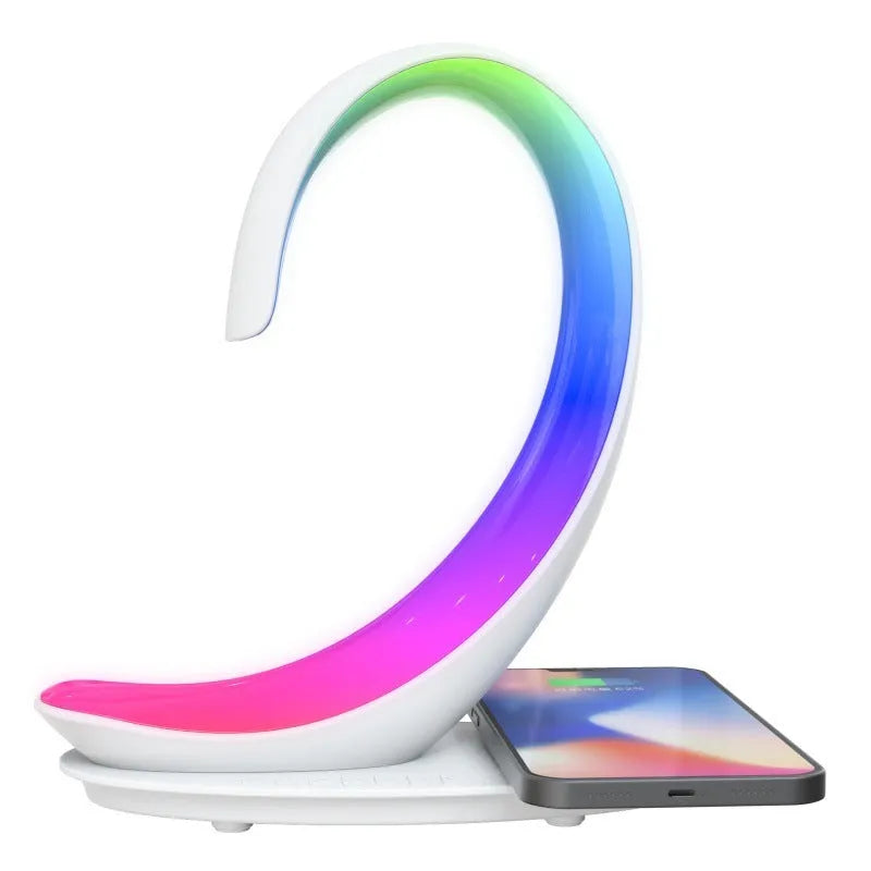 White swan shaped desk lamp with wireless charging pad and Bluetooth speaker featuring multi-colour lighting