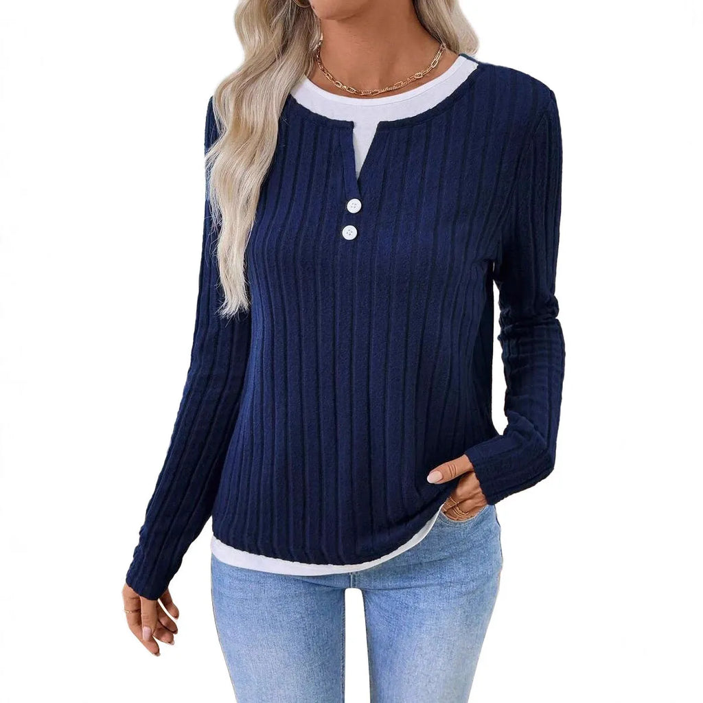 Women's black fake two-piece pullover sweater with round neck and button detail on concave stripe fabric