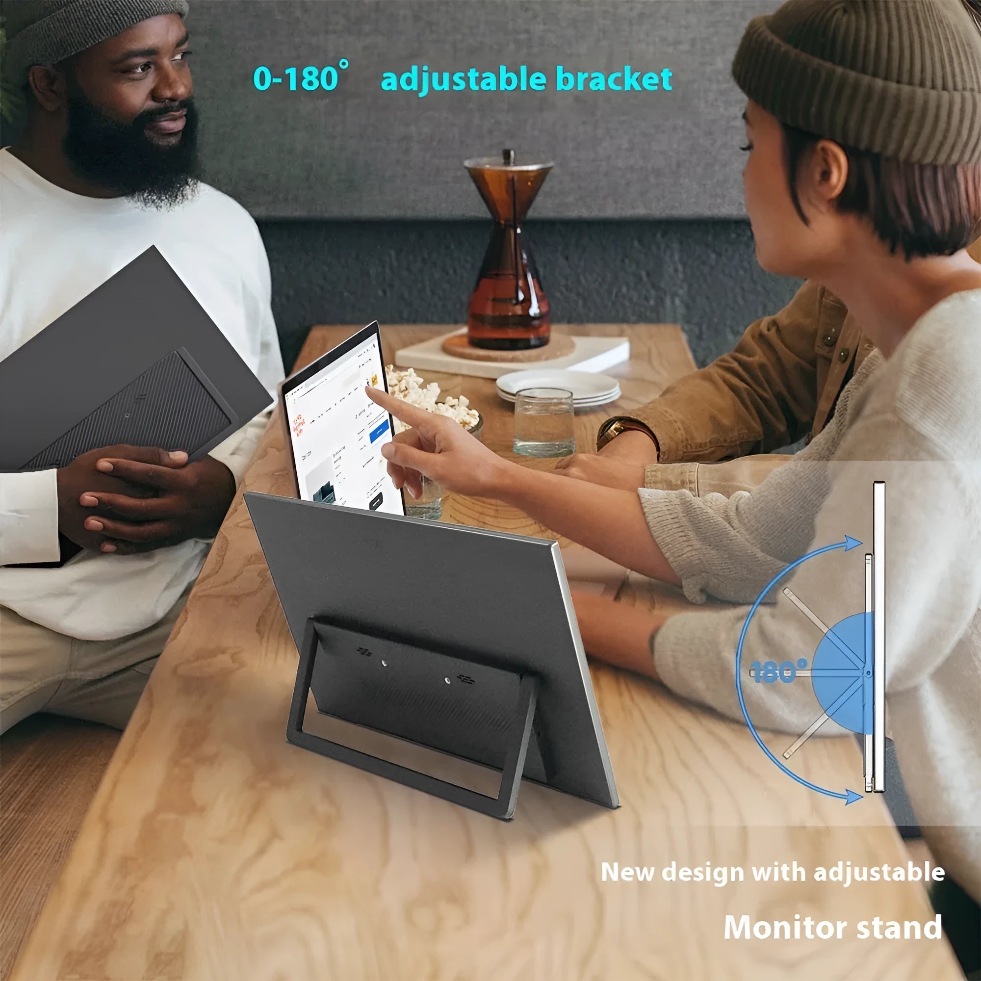 Black 15.6-inch portable monitor with adjustable stand shown with connectivity cables
