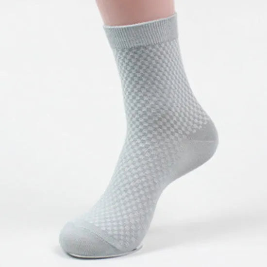 Men's bamboo fibre sock in small square pattern, shown in navy blue colour