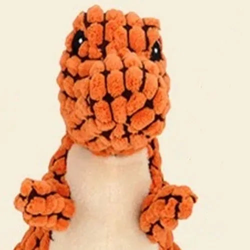 Set of four grey, green, and orange dog chew toys that produce sound, shown with size scale.