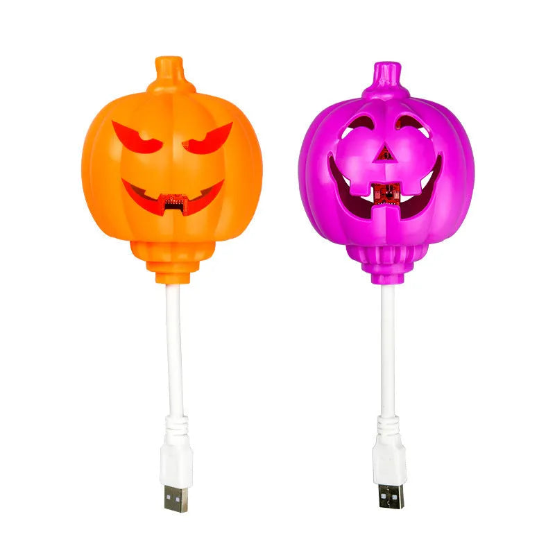Plastic pumpkin-shaped decorative lamp with purple or yellow light, standing 22cm tall.
