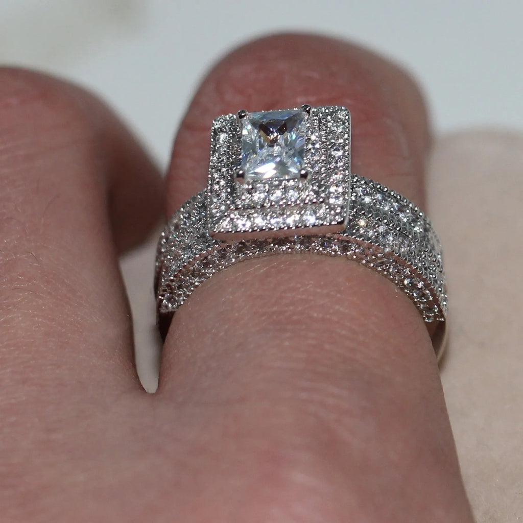 Silver zinc alloy double layer zircon ring on finger showing stacked design
