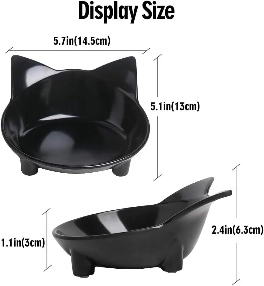 Set of four black shallow melamine pet bowls with non-slip rubber bases on a white surface.