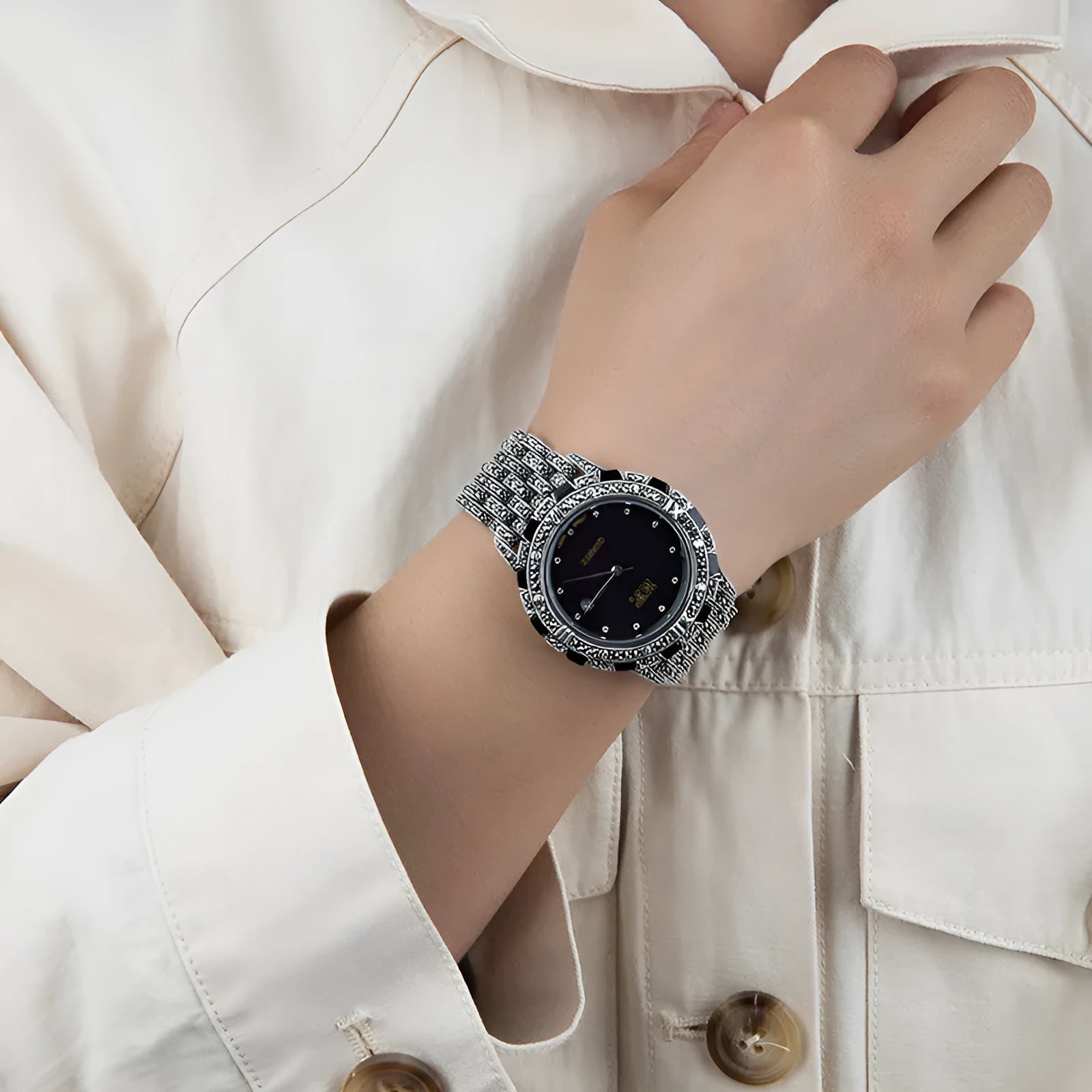 Quartz movement luxury romantic watch with metal strap, round dial, and jewellery buckle in black plate