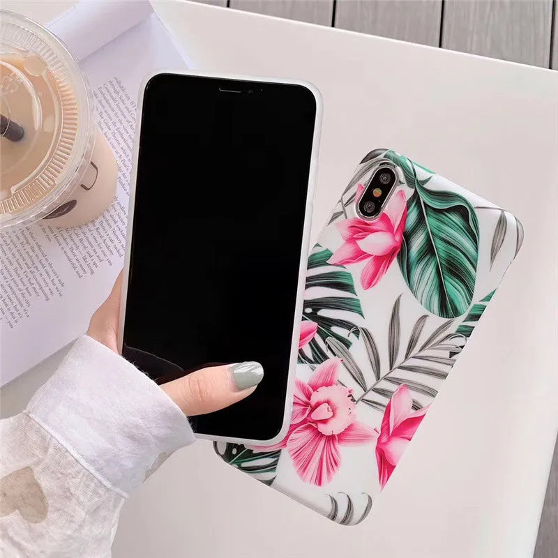 Pink floral pattern TPU iPhone case showing flower design on back cover for multiple iPhone models