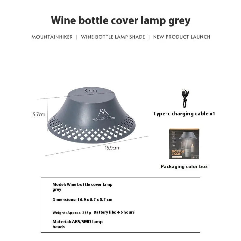 Beige wine bottle-shaped rechargeable camping lantern showing its size and USB-C port.
