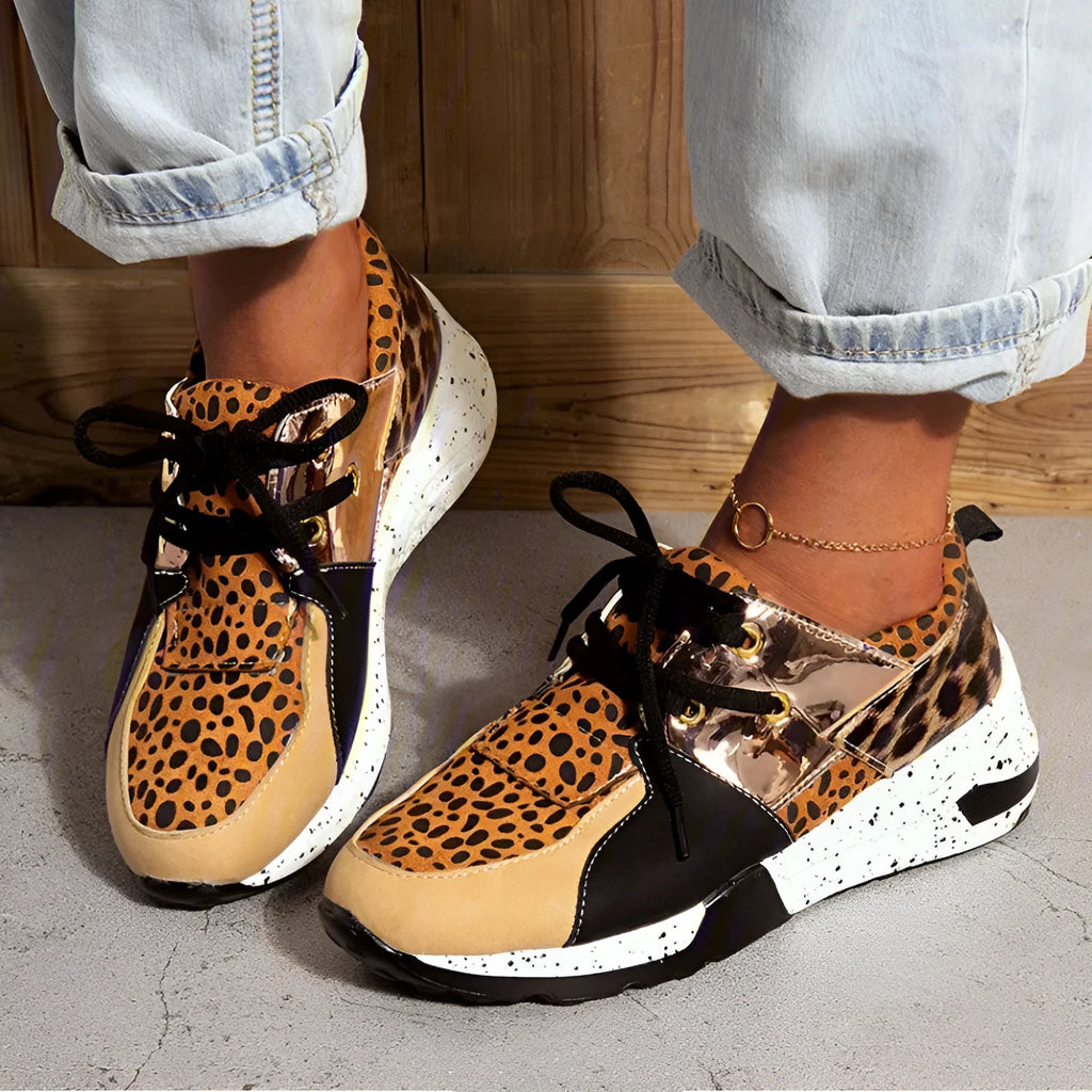 Women's wedge heel flat sneakers in breathable fabric showing round toe and slip-on design