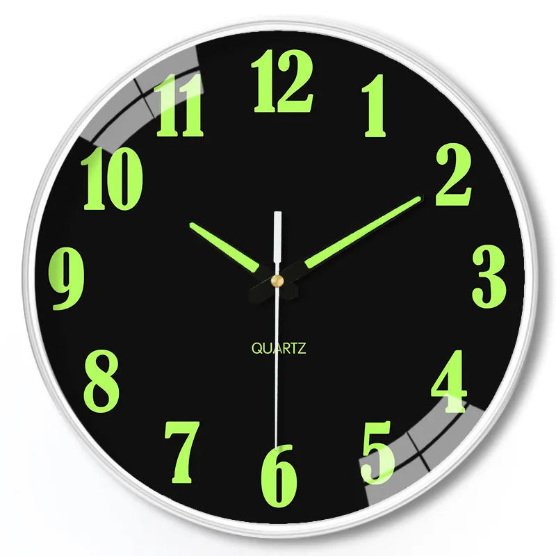 8 inch diameter modern wall clock with luminous hands on a wall.