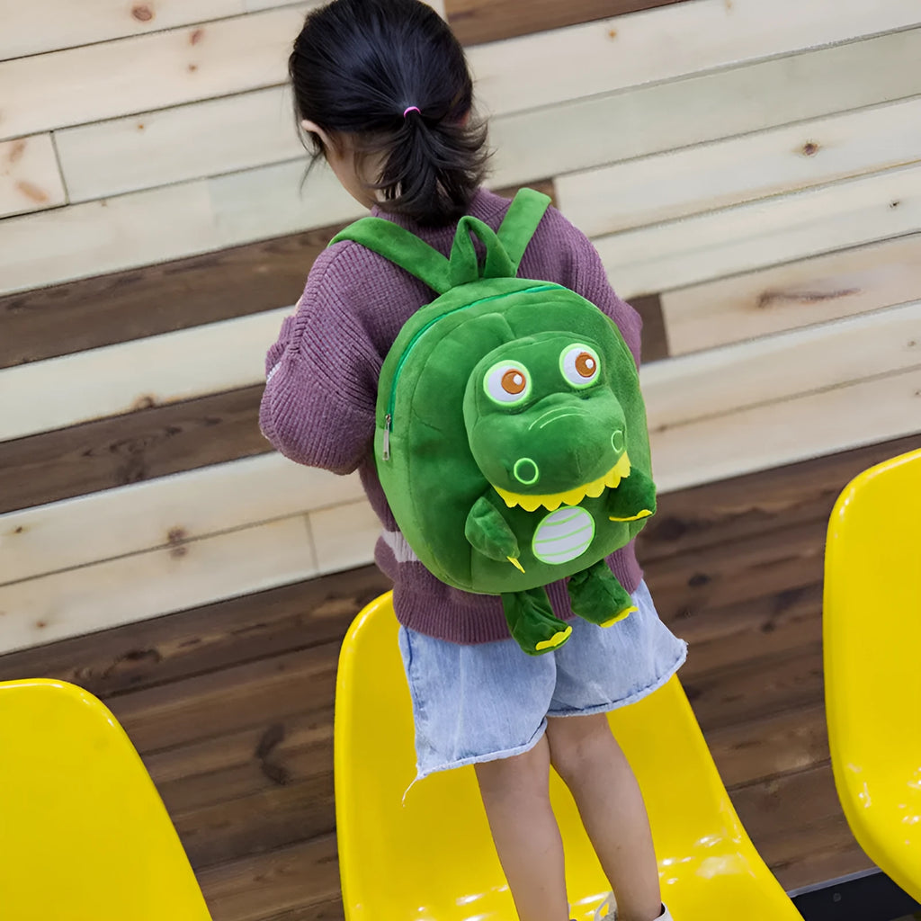 Soft blue dinosaur plush backpack for children with embroidery and a soft handle