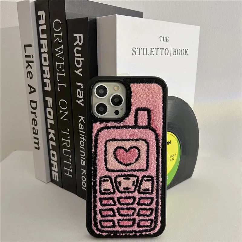 Pink towel embroidered TPU back cover case for iPhone on a table