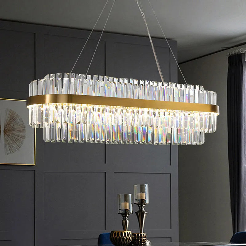 Adjustable height stainless steel LED crystal chandelier with multi-head fish-shaped design