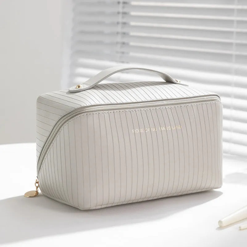 Vertical stripe pattern cubic makeup bag in PU leather measuring 22.5 cm