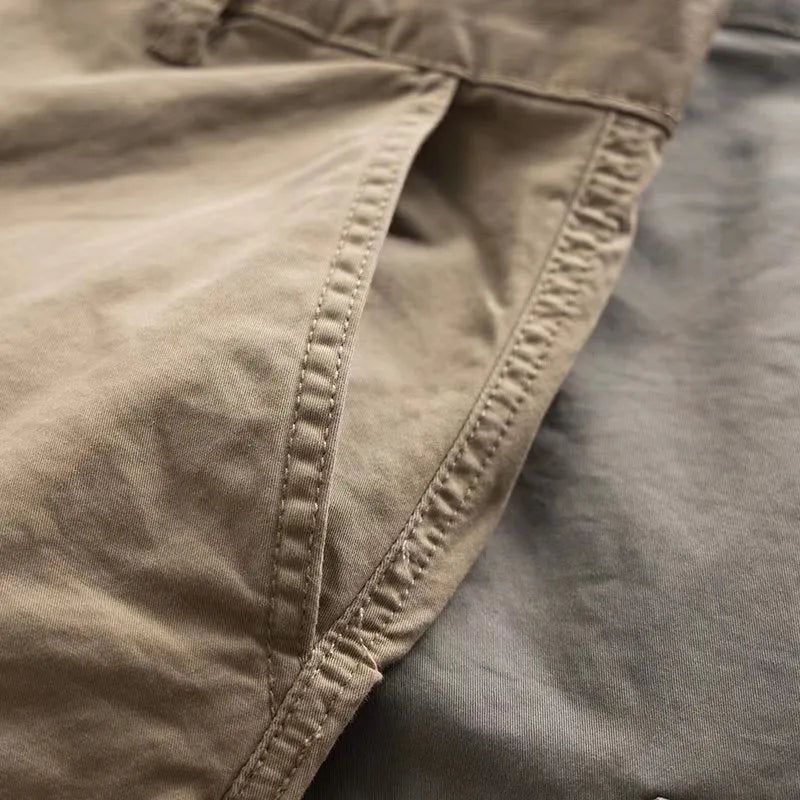 Men's cotton multi-pocket labour trousers in cropped length shown in khaki colour
