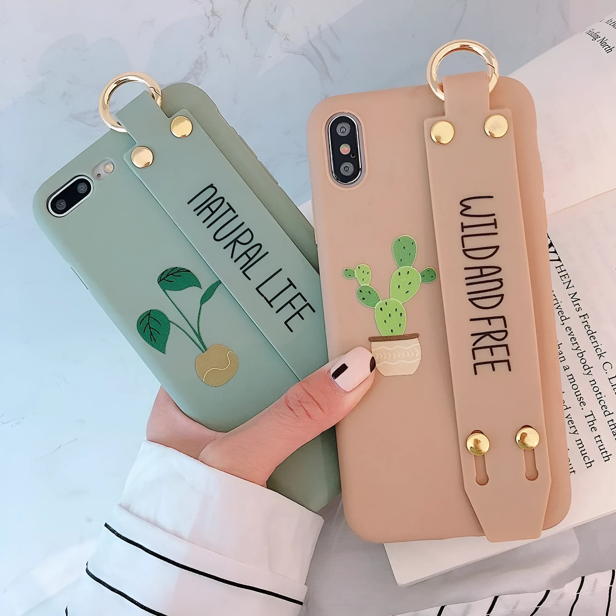 Green graffiti design phone case with a detachable silicone wristband, shown fitted on an iPhone.