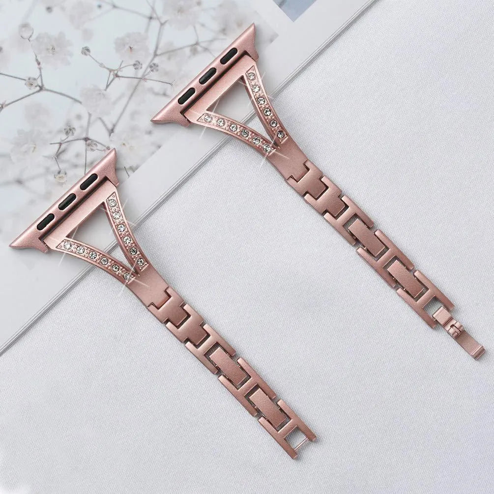 Silver herringbone diamond pattern metal strap for Apple Watch, showing adjustable links and connector lugs.