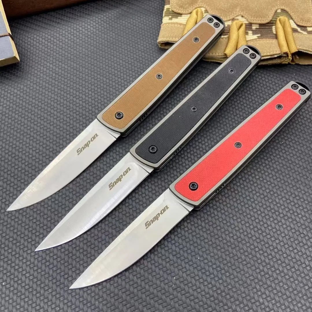 Folding fruit knife with stainless steel blade shown in open position with measurements