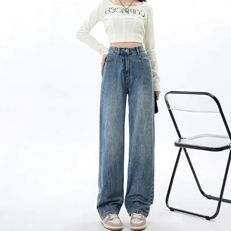 Women's high waist wide leg jeans in retro blue denim with straight leg cut
