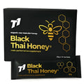T1 Black Thai Honey jar showing dark honey in household packaging