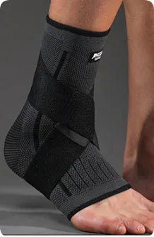 Sports ankle support brace in black colour shown on ankle during athletic activity