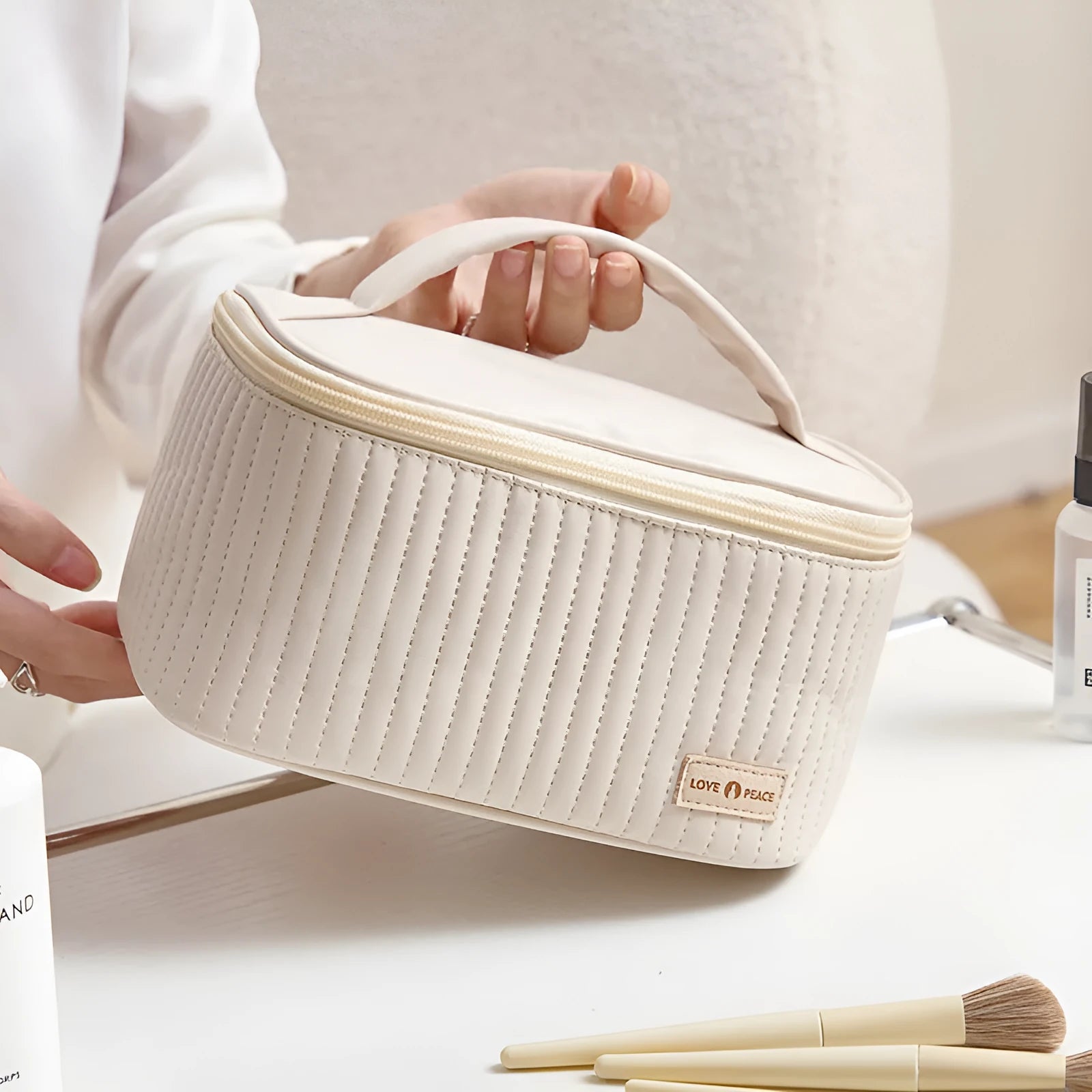Structured open-top women's makeup bag in PU leather, shown in a solid colour.