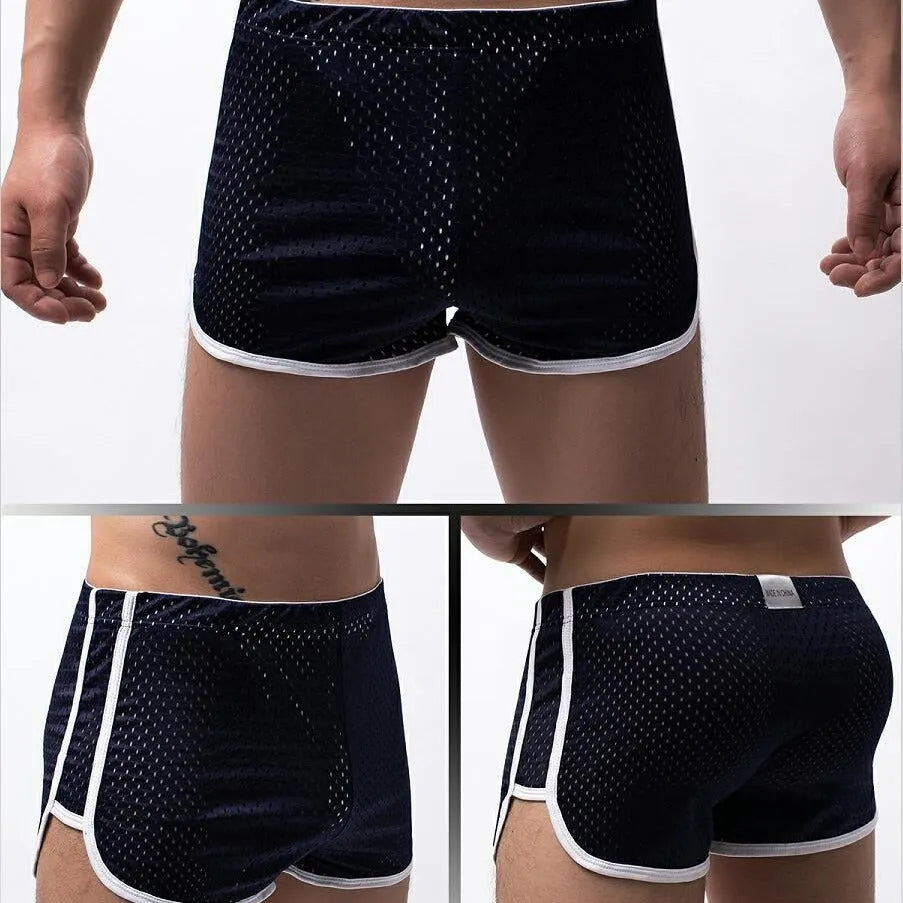Men's cotton boxer shorts in grey, showing mid waist design and breathable nylon fabric knit.