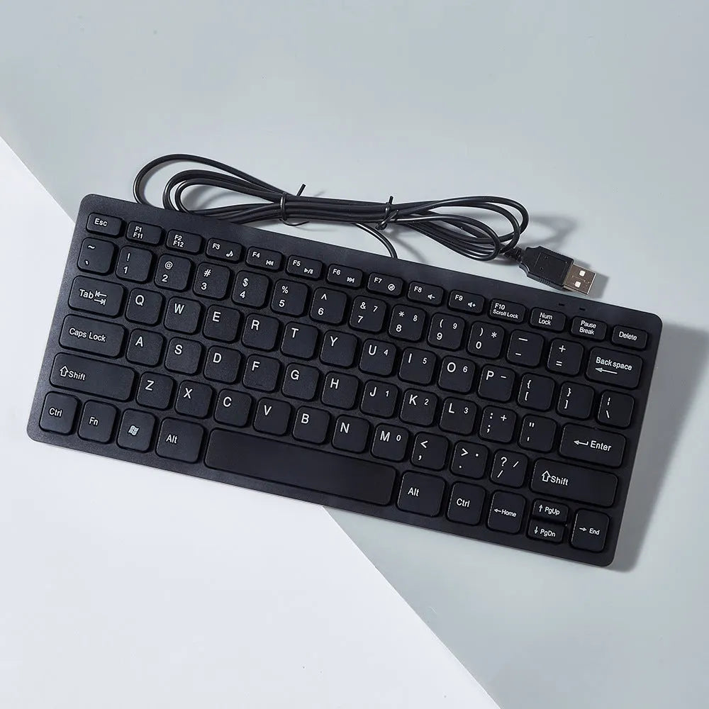 Wired USB mini keyboard in four colour options showing compact design and 1.3m cable