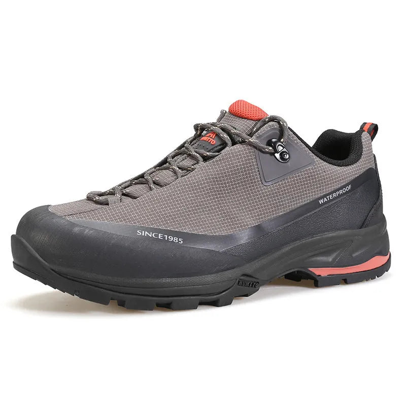 Men's low-top hiking boots in black with leather mesh upper and lace-up front.