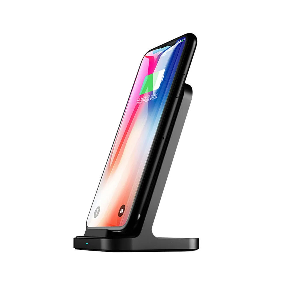 Dark grey vertical wireless charging stand for Apple iPhones on desk