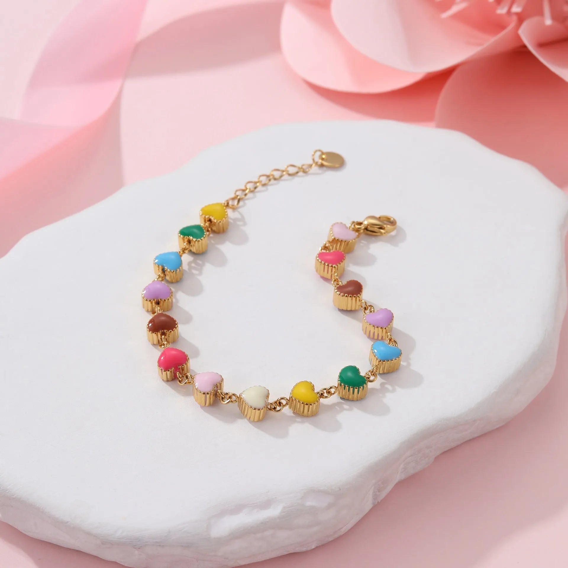 Gold or steel tone stainless steel love heart pendant bracelet for women.