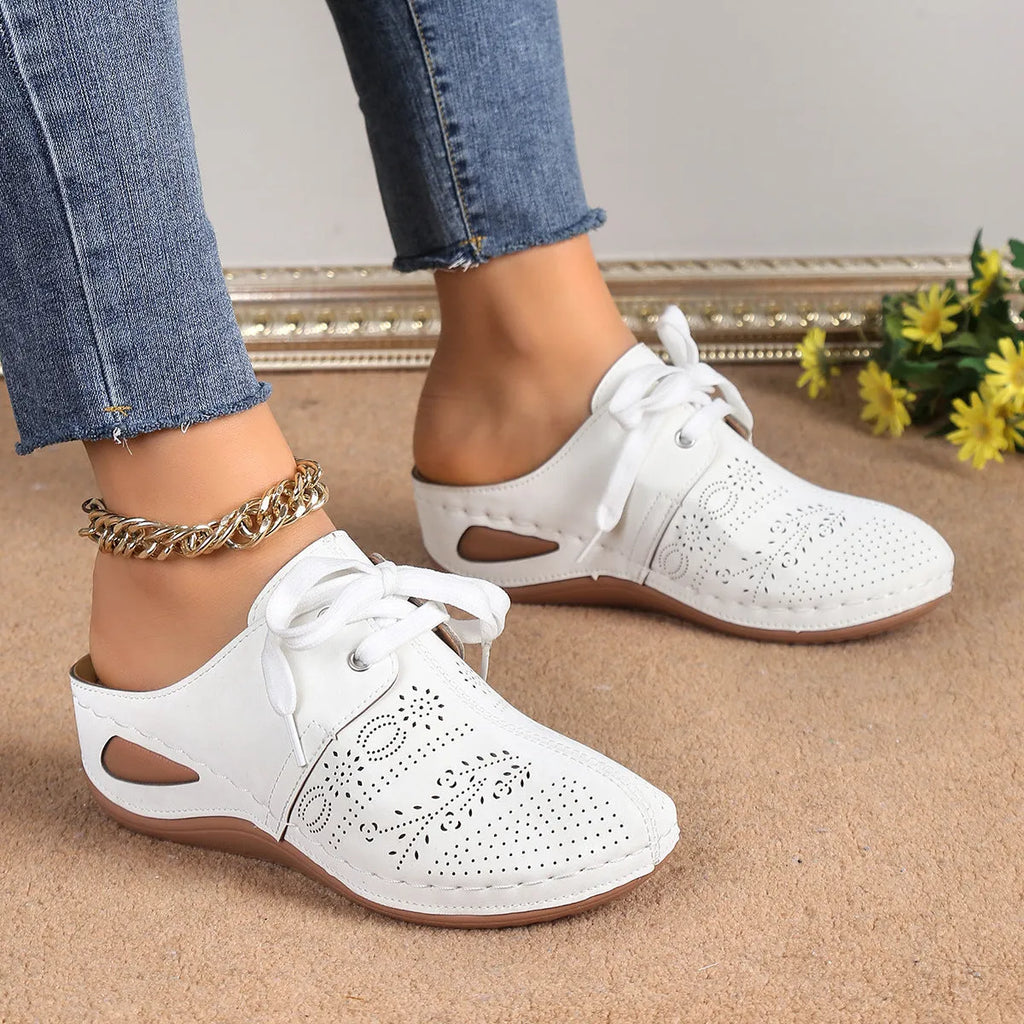 Women's summer wedge slippers with suede upper, lace-up design, and rubber sole in light grey.