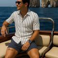 Men's blue beach shirt and shorts set on a hanger