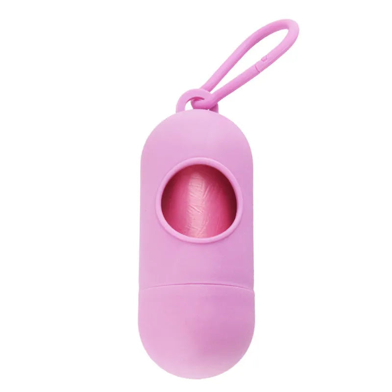 Compact dog waste bag dispenser with clip hook showing Velcro fastening for securing waste bag rolls