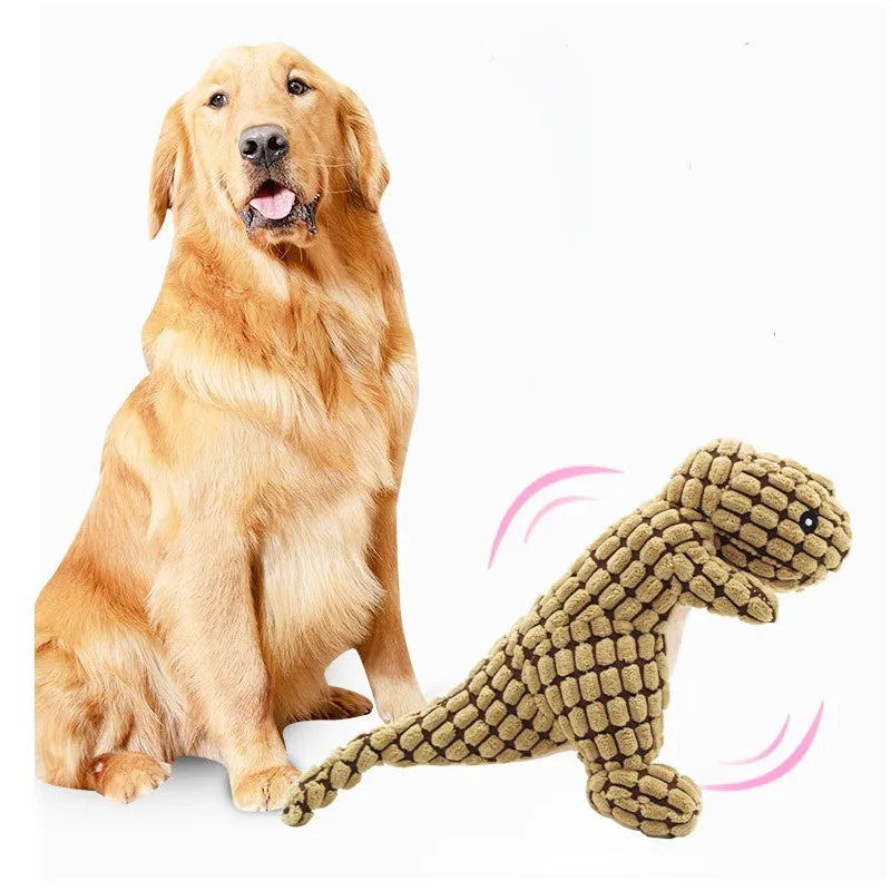 Set of four grey, green, and orange dog chew toys that produce sound, shown with size scale.