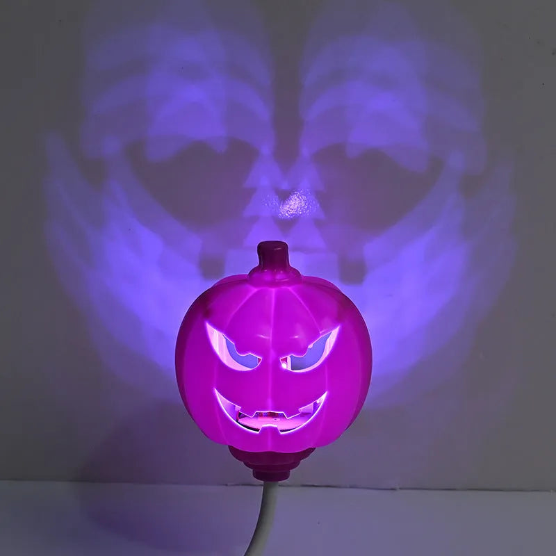 Plastic pumpkin-shaped decorative lamp with purple or yellow light, standing 22cm tall.