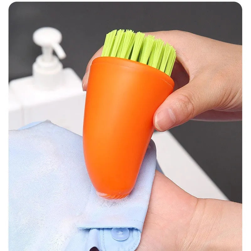 Orange and white radish-shaped nylon carrot cleaning brush for vegetables.
