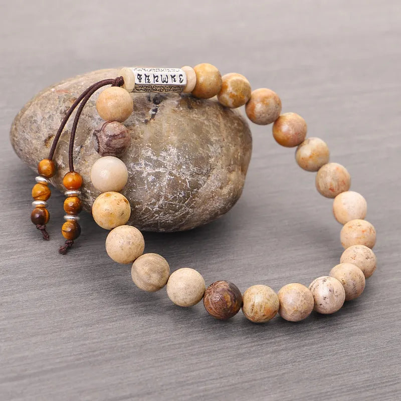 Handmade stone bead bracelet with wooden colour accents in retro minimalist design