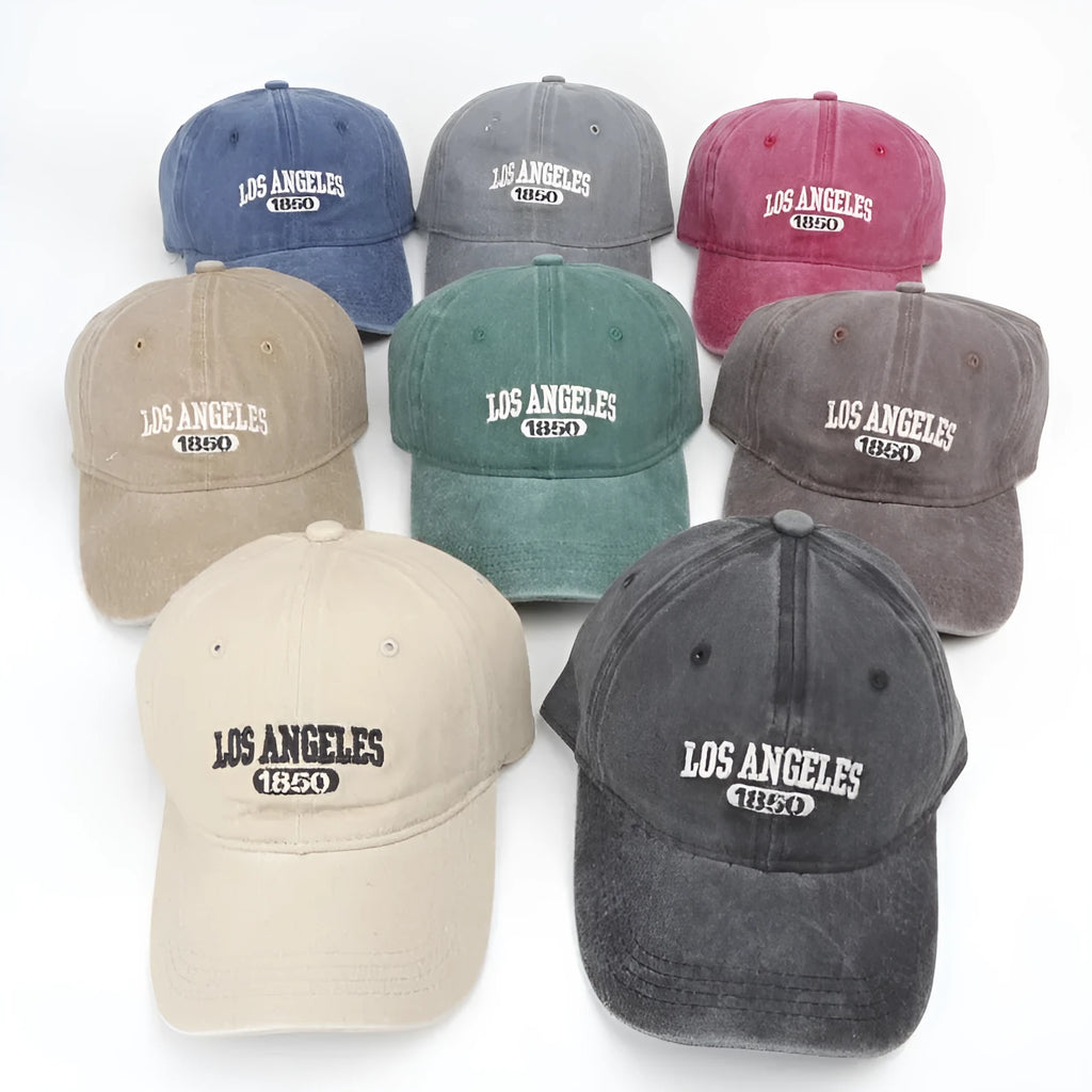 Retro personalised distressed acrylic peaked cap with embroidered letters, shown on adjustable strap.