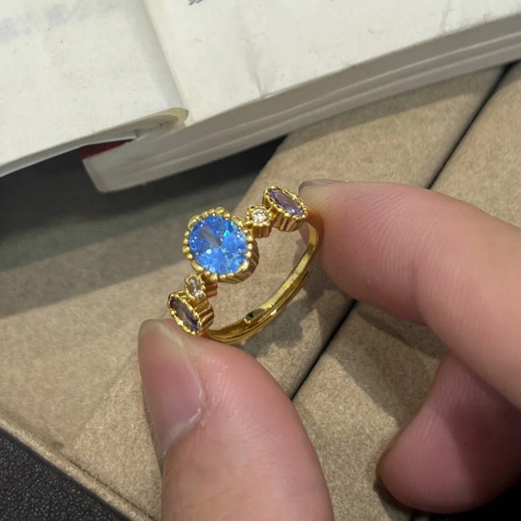 Vintage copper ring with blue gemstone and snowflake ice flower design