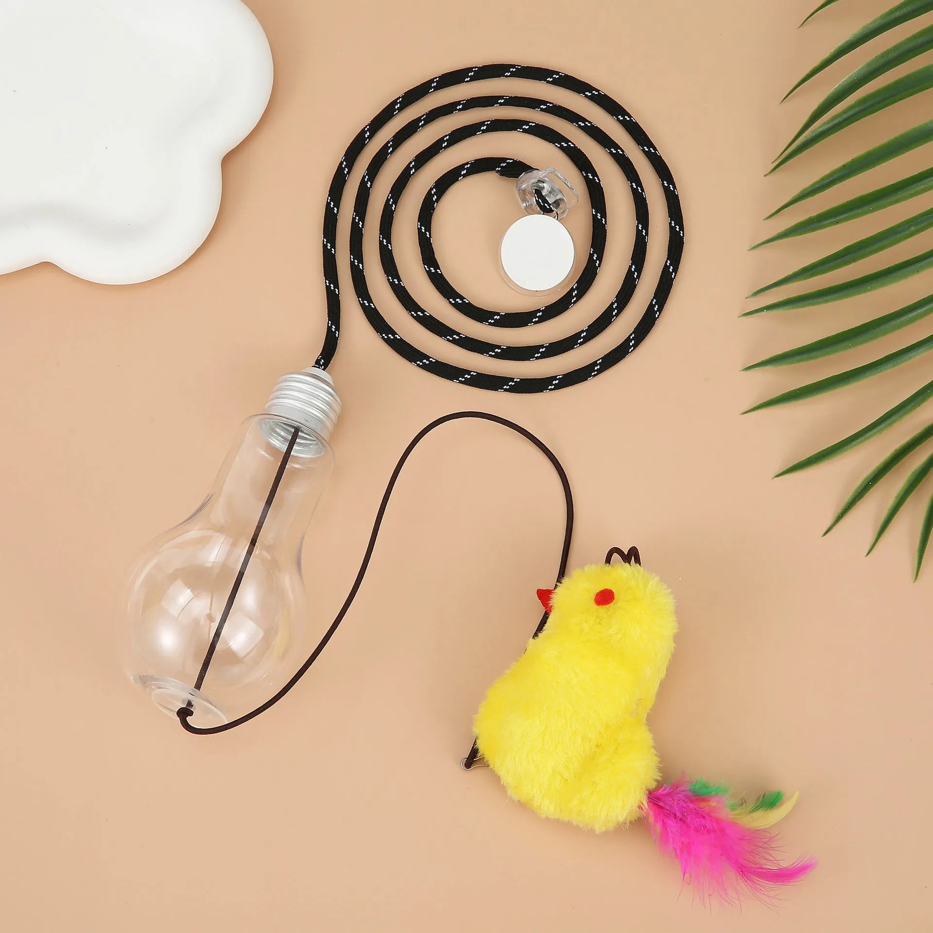Grey and yellow interactive cat toy with dangling mouse, elastic rope, and treat dispenser for door frames