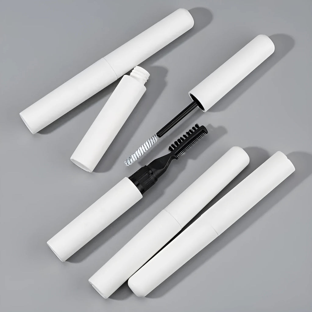 Brush applicator of pink and white eyebrow shaping gel for natural, long-lasting brows.