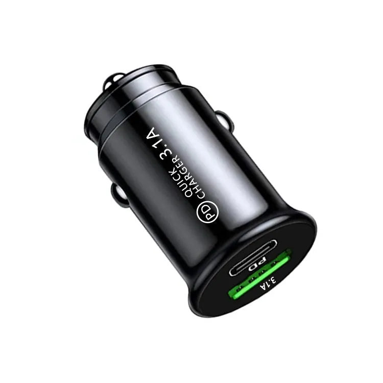 Black dual USB car charger plugged into vehicle 12V socket with phone charging