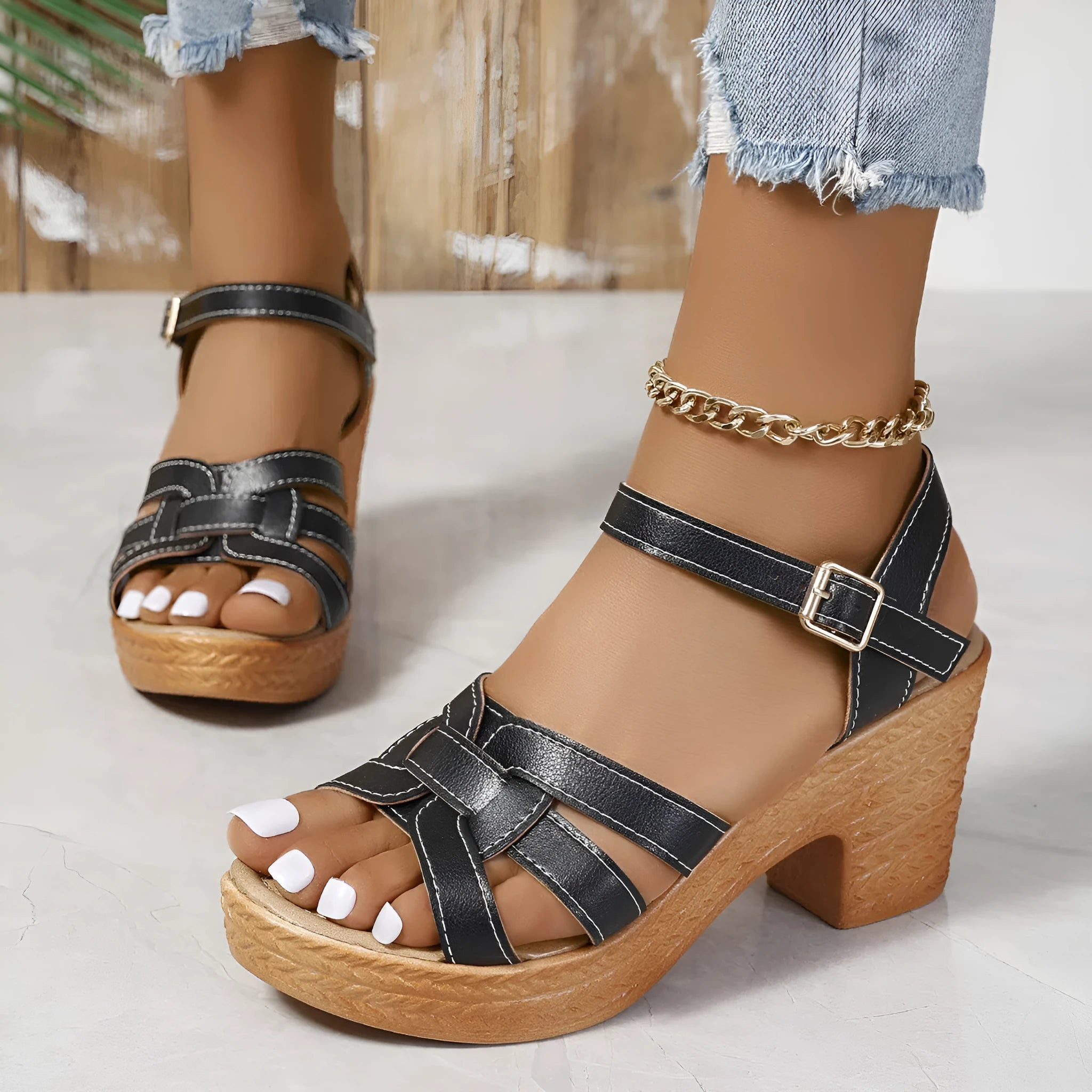 Plus size black women's peep toe sandals with chunky heel and ankle buckle strap.
