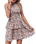 Women wearing a printed halter neck backless boho A-line summer dress in various colours