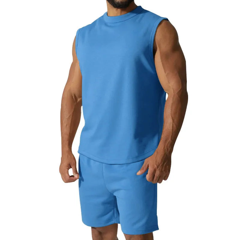 Men's sleeveless cotton-blend sports suit showing matching T-shirt top and shorts in a solid colour.