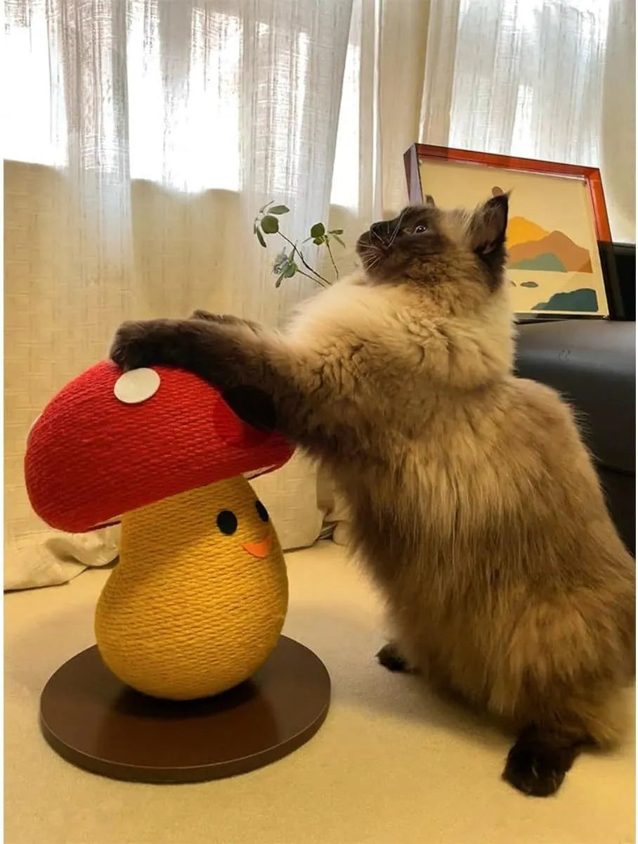 Mushroom-shaped foldable cardboard cat scratcher with accordion design on a carpet.