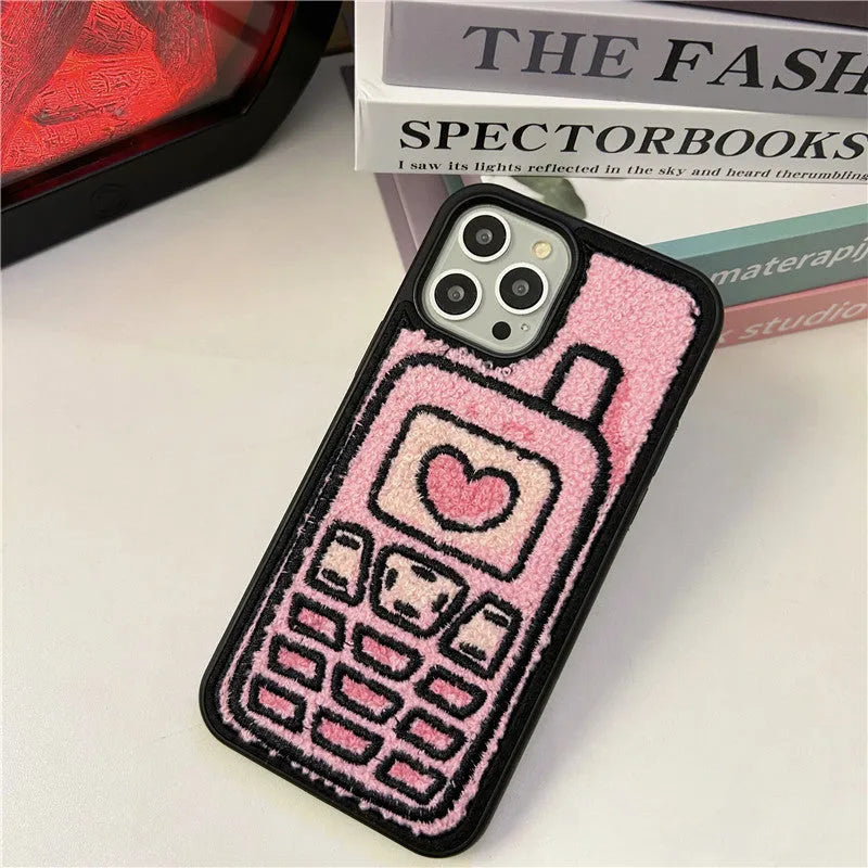 Pink towel embroidered TPU back cover case for iPhone on a table
